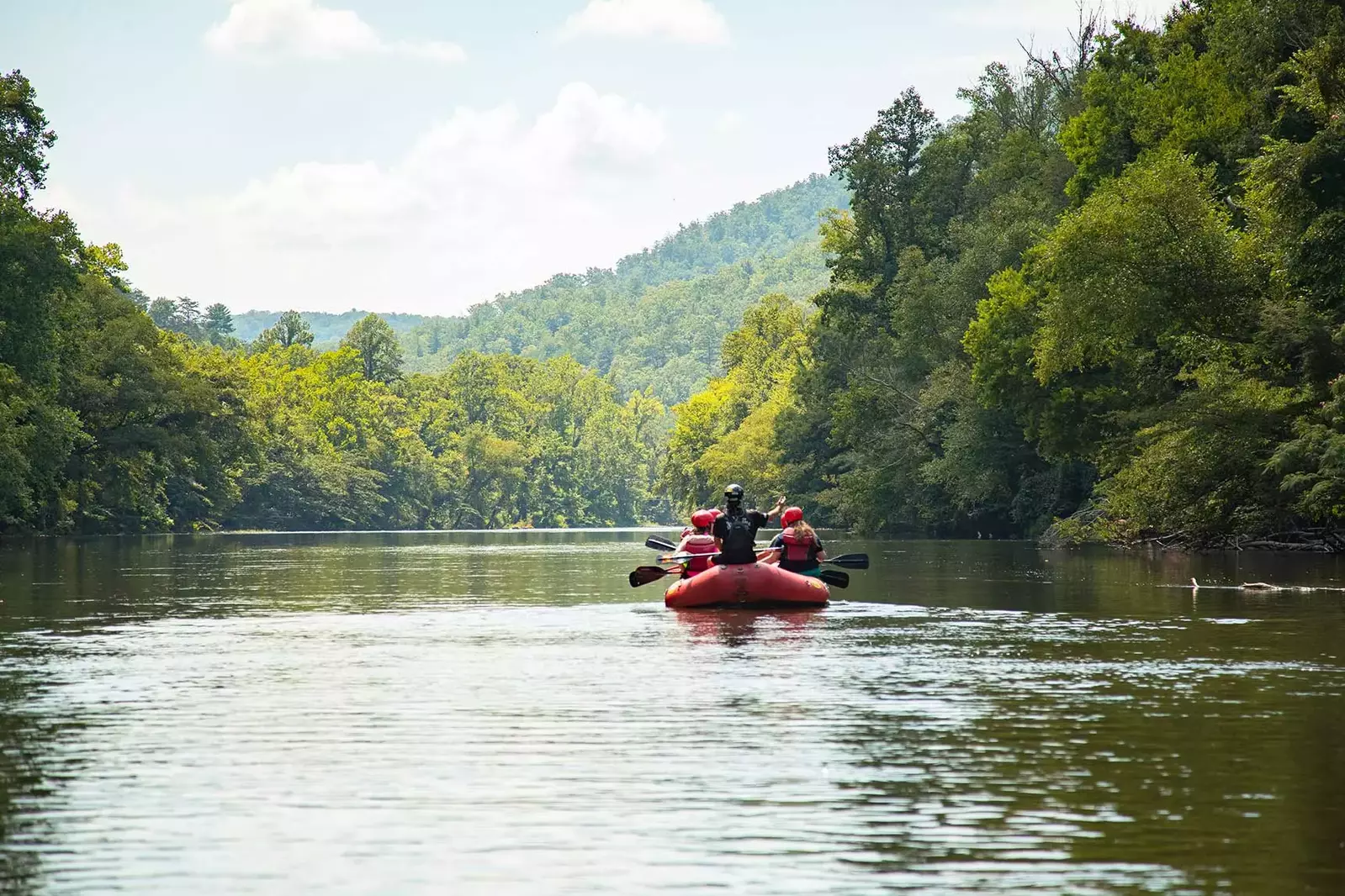 group-in-raft-on-river