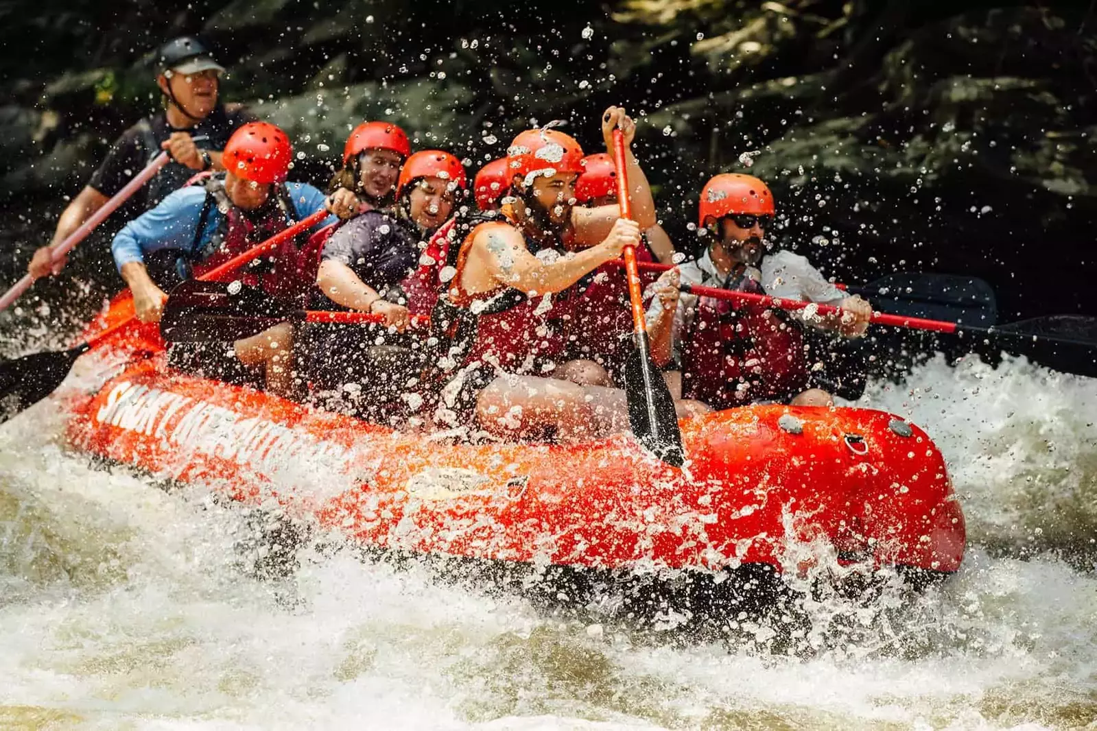 paddling through rapids on Upper River Rafting trip