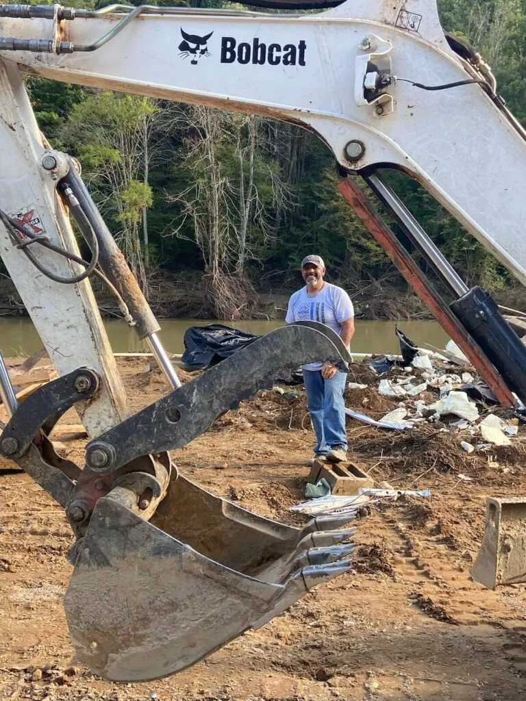 SMO worker helping rebuild