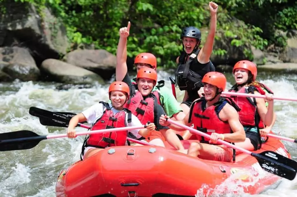 smiling group rafting