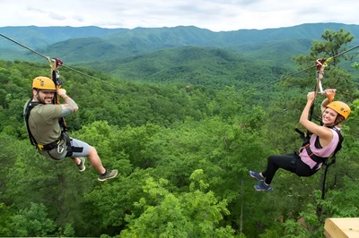 Two-friends-enjoying-the-mountaintop-ziplines-in-the-Smoky-Mountains (2)