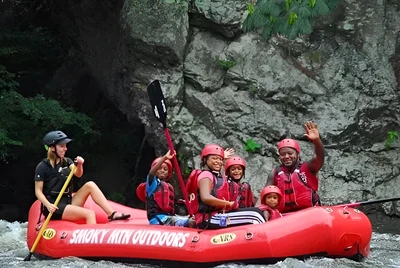 Happy family on a Gatlinburg TN rafting trip
