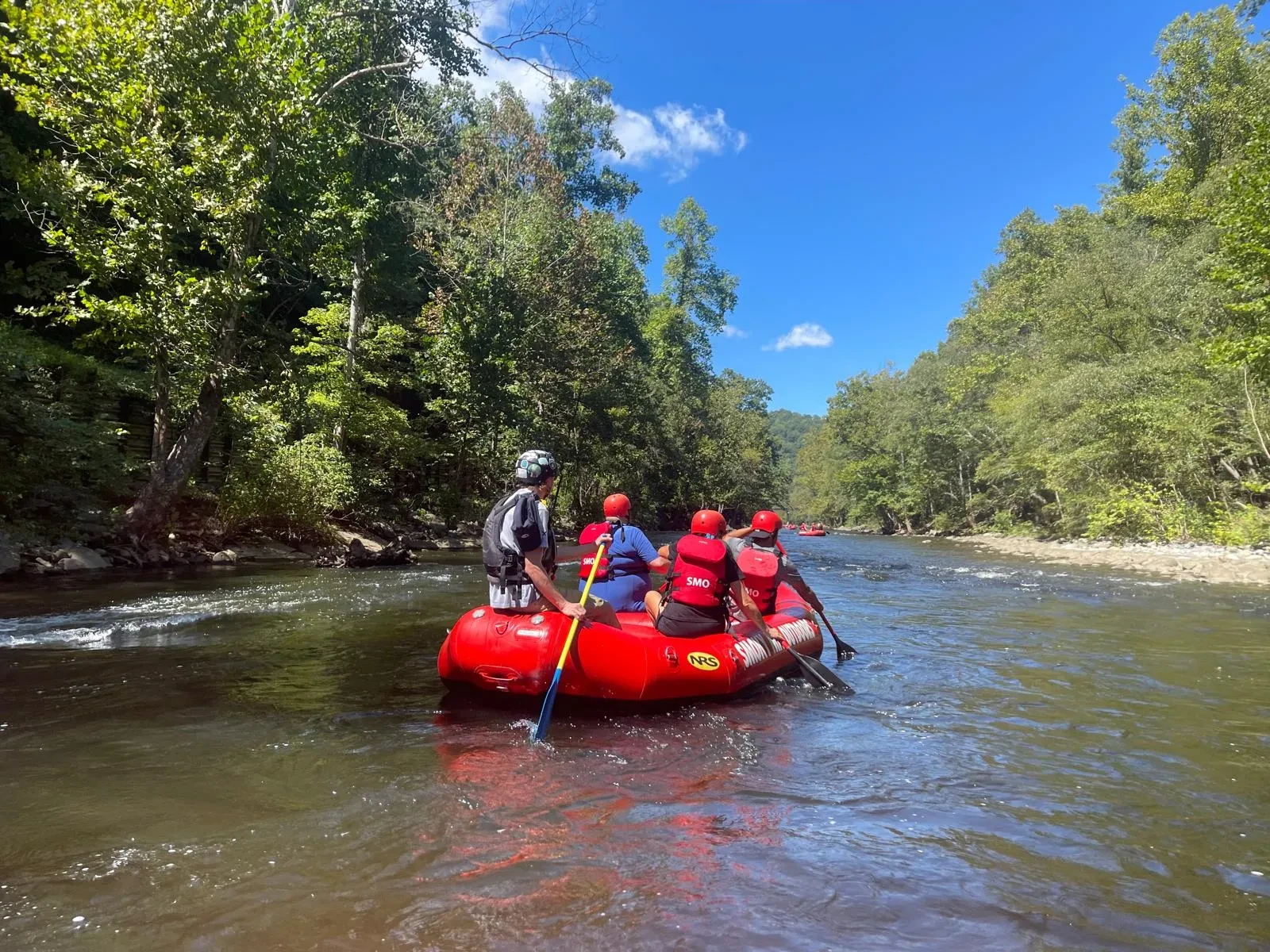 group rafting on the river