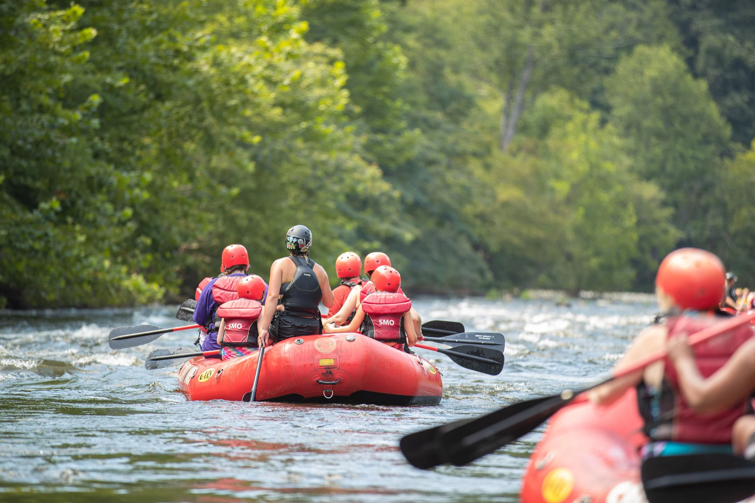 family rafting in the smoky mountains