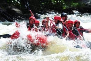 group of people white water rafting in tennessee
