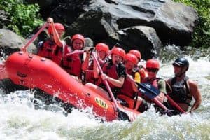 group of kids white water rafting in Gatlinburg