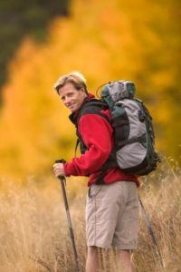 man hiking with backpack