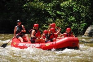 Happy family enjoying Gatlinburg white water rafting