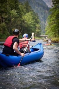 family enjoying a peaceful Pigeon River rafting adventure