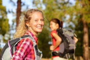 Woman hiking in the Smoky Mountains as part of our Gatlinburg white water rafting trip.