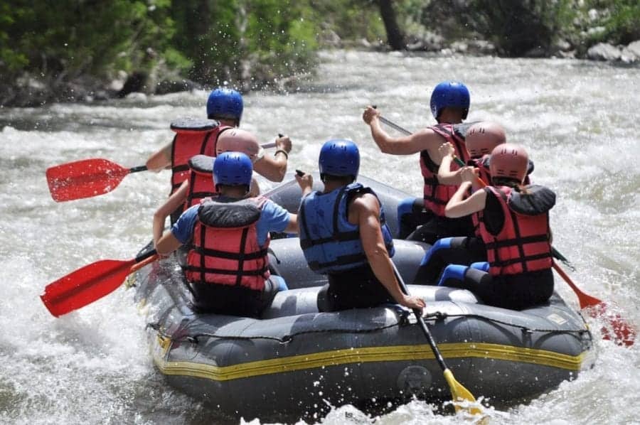 If you’re looking for some extreme fun while visiting the Gatlinburg area, participating in a Gatlinburg white water rafting and zipline combo is the perfect attraction for you. Many people travel to the Little Pigeon River to take part in white water rafting each year. When you choose to use this combination, there are many awesome advantages that will benefit you and your whole group. 1. Saves You Money Who doesn’t enjoy saving money? Rather than going from one attraction to another, and spending regular ticket prices on each attraction, you can save $20 when you book your Gatlinburg white water rafting and zipline combination package at Smoky Mountain Outdoors. You really can’t beat a great deal like that. This is the ultimate adventure, and is hard not to pass it up when you know you are saving money. 2. No Experience Necessary One of the great things about Gatlinburg white water rafting and zipline is that they both require no prior experience. There are plenty of experts available along each step of the way to provide you with all of the information you need to know for a successful adventure at Smoky Mountain Outdoors. All of our rafting staff have been on at least 15 trips down the river, before they take you out in a raft. You will also experience about a 20 minute safety and information session to equip you with a basic knowledge of rafting which is all you will need. Safety is important, and we make sure each individual’s safety is a priority, and that they understand everything discussed in the information session. 3. Fun For Everyone The only requirement for this combo is that you are 7 years of age for the zipline, but we have rafting trips available for children as young as 3. Up to 7 people can be placed in a raft with the guide, so there is plenty of room for everyone. You can expect there to be at least an hour and a half adventure down the river that is well worth the great value. 4. Makes Great Memories A trip to Gatlinburg with friends and family will always come with lots of memories to be made. However, you can make over the top memories with everyone in your group while taking part in our rafting and zipline combo. Not to mention you can go rafting rain or shine, and taking a trip down the Little Pigeon River in the rain is a unique way to experience white water rafting, and also makes for a great story. 5. Great Way to Tour the Little Pigeon River The Little Pigeon River is an important part of the area’s history as it used to be the main source of water for residents in the past, and also used to create energy and power for some of our old mills. It is a great place to see some of the best scenery and wildlife Gatlinburg has to offer, and you can enjoy it right from your raft. While on a Gatlinburg white water rafting and zipline trip you can appreciate the soothing sound of the river to help you destress along the ride. At Smoky Mountain Outdoors we have levels of white water rafting for everyone, including the most extreme of rafters. To learn more about white water rafting in Gatlinburg with us, take a look at our different Gatlinburg rafting trips for more information.