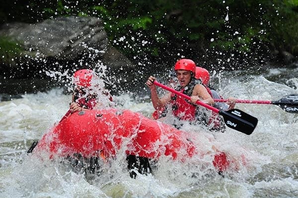 A small group enjoying Extreme white water rafting near Gatlinburg TN.