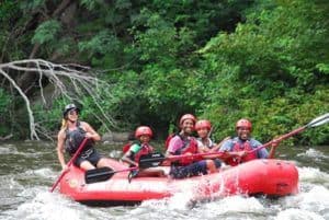 Happy family Gatlinburg river rafting.