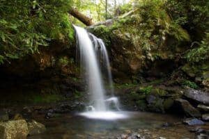 Grotto Falls, one of the top Smoky Mountain waterfalls.