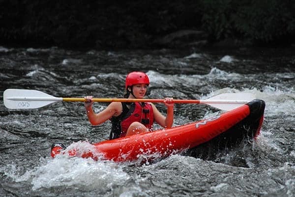 A young woman on a Smoky Mountain kayaking trip.