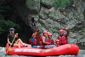 Happy family on a Gatlinburg TN rafting trip.