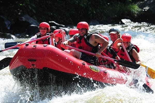 A happy group enjoying Gatlinburg TN white water rafting.