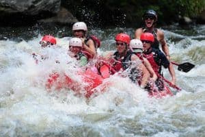 A happy group of people on a Gatlinburg TN white water rafting adventure.
