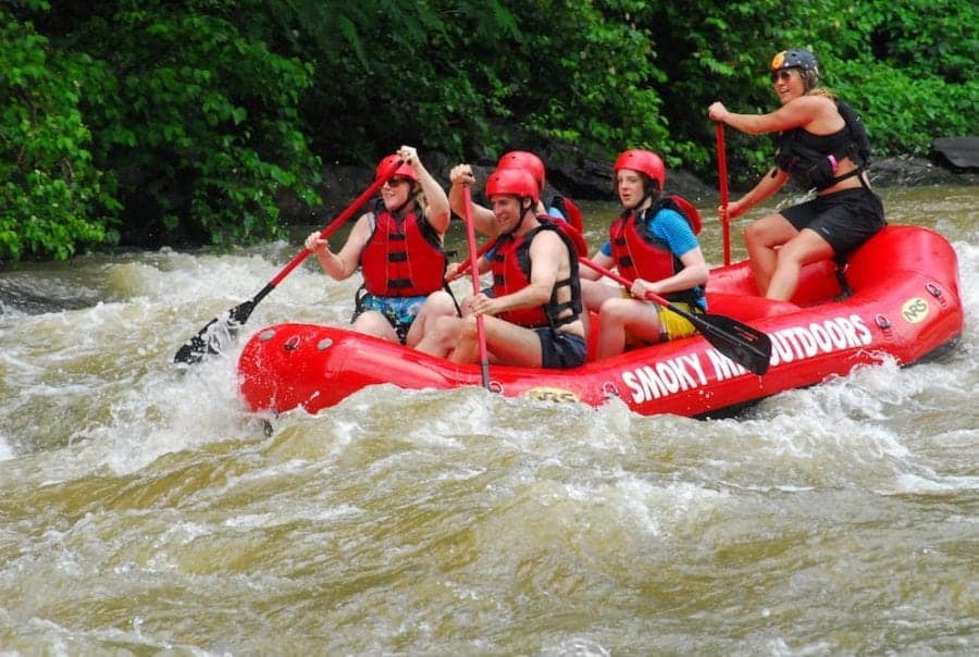 A group of friends enjoying river rafting near Gatlinburg TN.
