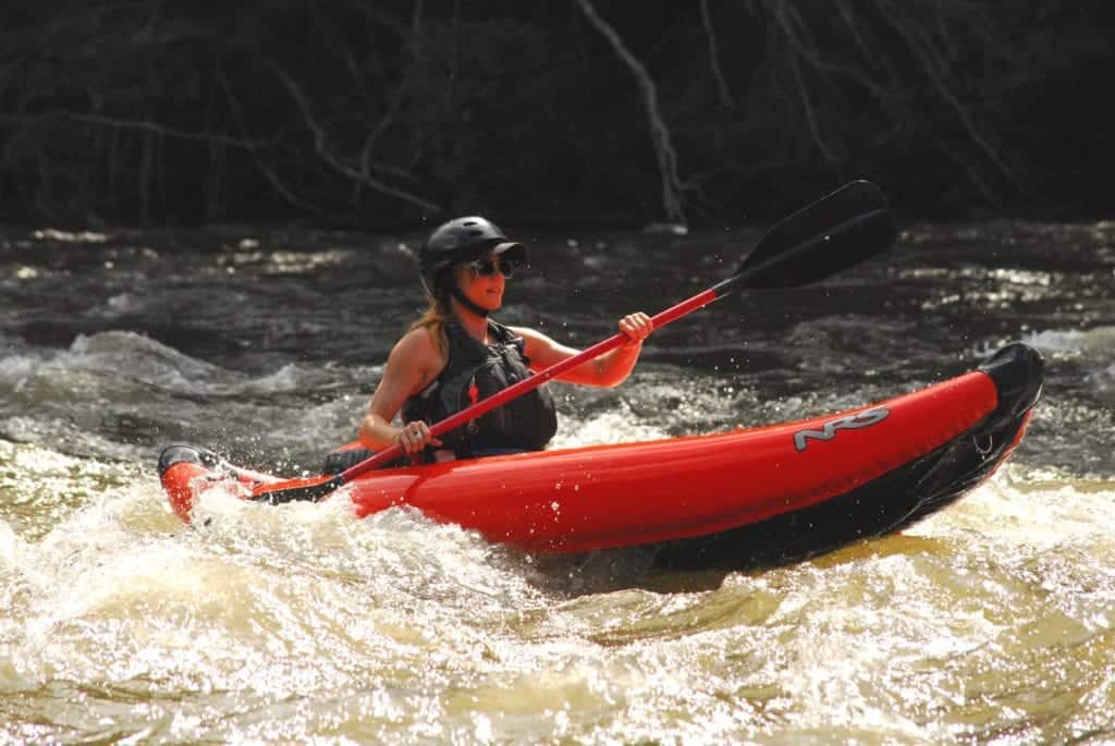 Woman Kayaking with Smoky Mountain Outdoors on Lower Pigeon River