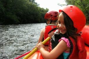 kid white water rafting in the smoky mountains