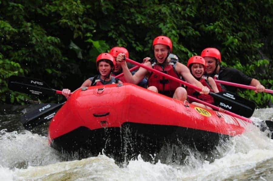 group of friends rafting in the smoky mountains