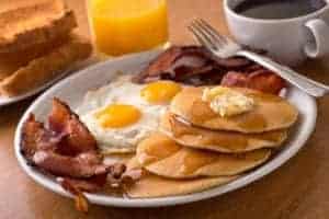 Pancakes with eggs and bacon