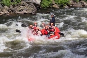 group of people rafting on the river