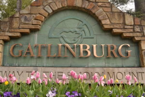Gatlinburg sign with spring flowers