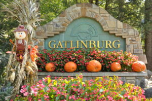 Gatlinburg sign decorated with pumpkins and fall decor