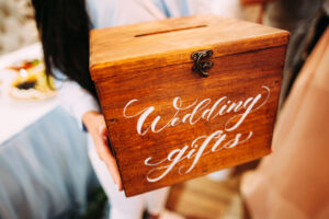 wooden box labeled Wedding Gifts